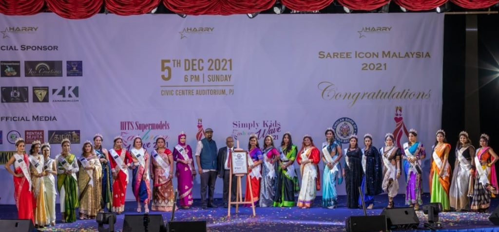 HITS Talent Agency entered into Cholan Book of World Records for the most number of models on a catwalk adorning an Indian traditional saree for Saree Icon Malaysia 2021 event.